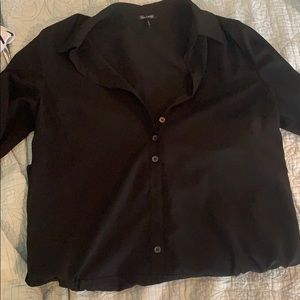 Black, work-like romper.